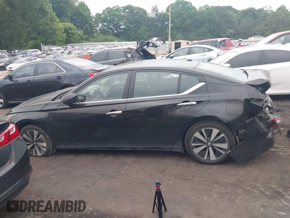 2019 Nissan Altima SV with VIN 1N4BL4DV4KC122929, listed as a IAAI auction lot 42126187 with 146,842 mi miles and . Bid and sale history available at DreamBid. Image 14.
