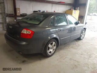 2004 Audi A4 1.8T with VIN WAULC68E04A055889, listed as a IAAI auction lot 41986309 with 124,598 mi miles. Bid and sale history available at carsss.com. Image 4.