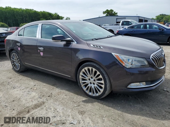2014 Buick LaCrosse Premium II with VIN 1G4GF5G3XEF129714, listed as a Copart auction lot 58734075 with 140,024 mi miles and Salvage title. Bid and sale history available at DreamBid. Image 4.