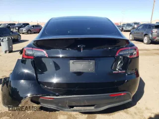 2023 Tesla Model Y Performance with VIN 7SAYGDEF3PF773031, listed as a Copart auction lot 47105765 with 25,604 mi miles and Salvage Title. Bid and sale history available at DreamBid. Image 6.