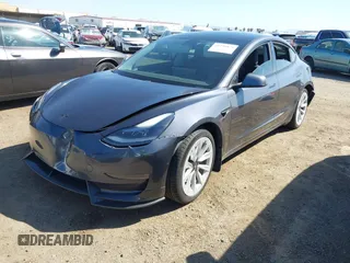 2021 Tesla Model 3 Long Range with VIN 5YJ3E1EB9MF997442, listed as a IAAI auction lot 41759875 with 87,059 mi miles. Bid and sale history available at carsss.com. Image 18.