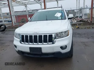 2013 Jeep Grand Cherokee Laredo with VIN 1C4RJFAG6DC557163, listed as a IAAI auction lot 42019052 with 125,058 mi miles. Bid and sale history available at carsss.com. Image 11.