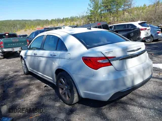 2014 Chrysler 200 LX with VIN 1C3CCBAB2EN208735, listed as a IAAI auction lot 41623000 with 104,819 mi miles and . Bid and sale history available at carsss.com. Image 3.
