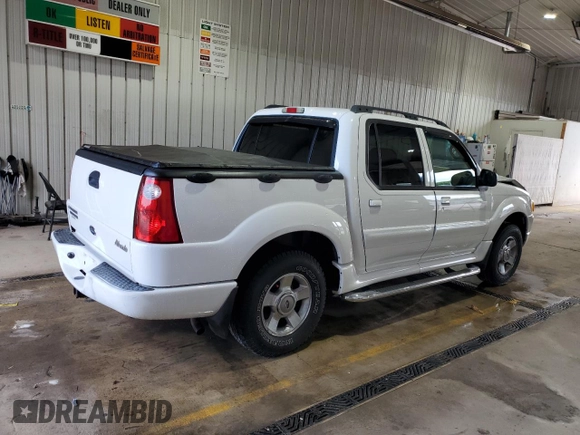 2004 Ford Explorer Sport Trac XLS with VIN 1FMZU77K74UB23543, listed as a Copart auction lot 62859625 with 96,873 mi miles and Salvage title. Bid and sale history available at DreamBid. Image 3.
