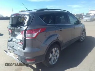 2013 Ford Escape SEL with VIN 1FMCU9H9XDUB32041, listed as a IAAI auction lot 36310371 with 99,560 mi miles. Bid and sale history available at carsss.com. Image 4.