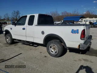 2000 Ford F-150 XL with VIN 1FTRX18W5YKB13685, listed as a Copart auction lot 48286865 with 249,053 mi miles and Salvage Title. Bid and sale history available at carsss.com. Image 2.
