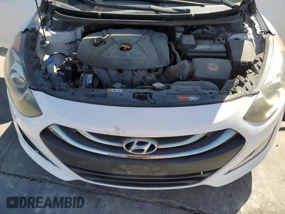 2013 Hyundai Elantra GT with VIN KMHD35LE4DU066011, listed as a Copart auction lot 72745354 with 249,335 mi miles and Salvage Title. Bid and sale history available at carsss.com. Image 12.