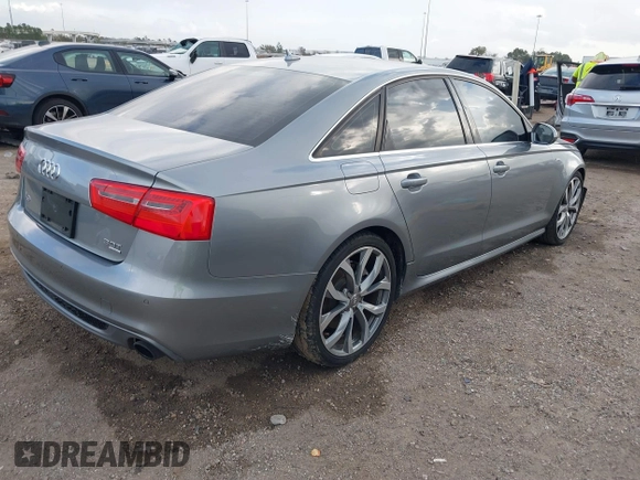 2013 Audi A6 3.0T Prestige with VIN WAUHGAFC3DN131239, listed as a IAAI auction lot 41168869 with 134,628 mi miles. Bid and sale history available at carsss.com. Image 4.