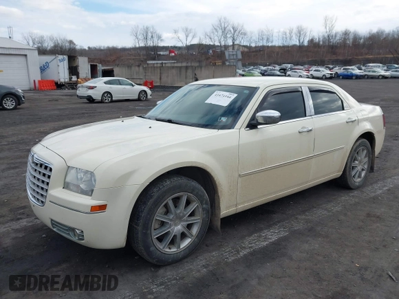 2010 Chrysler 300 Touring with VIN 2C3CK5CV7AH188979, listed as a IAAI auction lot 41674166 with 143,374 mi miles. Bid and sale history available at carsss.com. Image 2.