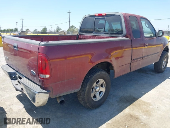 2003 Ford F-150 XL with VIN 1FTRX17203KA28485, listed as a IAAI auction lot 42503359 with 221,432 mi miles and . Bid and sale history available at DreamBid. Image 4.