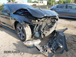 2015 Ford Mustang EcoBoost z VIN 1FA6P8TH1F5303375, wystawiony jako IAAI lot #40158795 z przebiegiem 134 668 mil mil oraz . Historia ofert i sprzedaży dostępna na DreamBid. Obrazek 16.