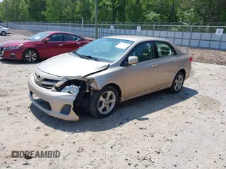 2011 Toyota Corolla L with VIN 2T1BU4EE1BC634175, listed as a IAAI auction lot 42073944 with 179,083 mi miles. Bid and sale history available at carsss.com. Image 2.
