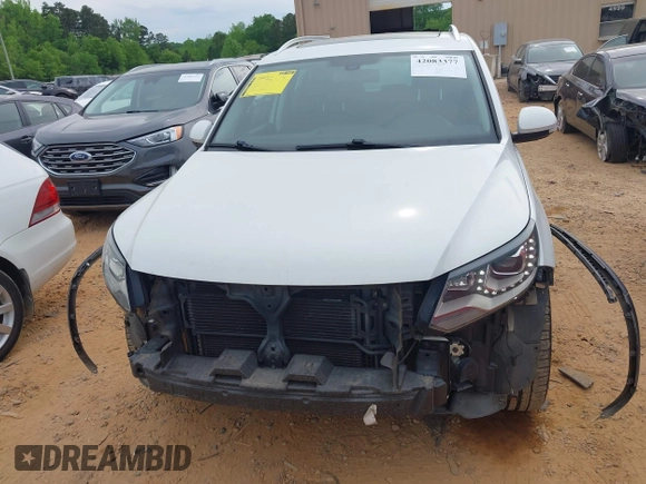 2016 Volkswagen Tiguan S with VIN WVGBV7AXXGW585445, listed as a IAAI auction lot 42083377 with 111,011 mi miles and . Bid and sale history available at DreamBid. Image 12.