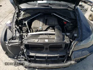 2013 BMW X6 xDrive35i z VIN 5UXFG2C55DL783005, wystawiony jako Copart lot #53490695 z przebiegiem 159 848 mil mil oraz Szkoda całkowita • Salvage title. Historia ofert i sprzedaży dostępna na DreamBid. Obrazek 12.