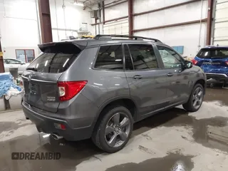 2019 Honda Passport Touring with VIN 5FNYF8H98KB007933, listed as a IAAI auction lot 41953263 with 87,614 mi miles and . Bid and sale history available at DreamBid. Image 4.