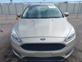 2018 Ford Focus SE with VIN 1FADP3FE7JL230870, listed as a IAAI auction lot 42021541 with 84,000 mi miles. Bid and sale history available at carsss.com. Image 12.
