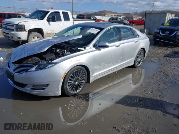 2014 Lincoln MKZ z VIN 3LN6L2J95ER830342, wystawiony jako IAAI lot #41876269 z przebiegiem 137 089 mil mil oraz . Historia ofert i sprzedaży dostępna na DreamBid. Obrazek 2.