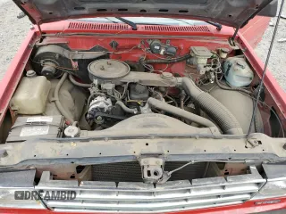 1988 GMC Sonoma with VIN 1GTBS14E2J2539806, listed as a Copart auction lot 71105184 with 141,085 mi miles and Salvage Title. Bid and sale history available at DreamBid. Image 12.