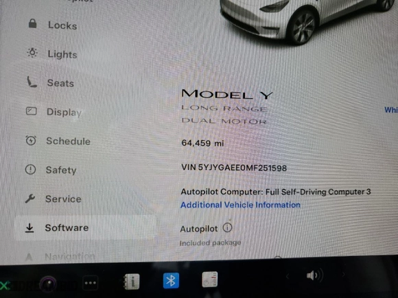 2021 Tesla Model Y Long Range with VIN 5YJYGAEE0MF251598, listed as a Copart auction lot 42151475 with 64,459 mi miles and Salvage Title. Bid and sale history available at carsss.com. Image 9.
