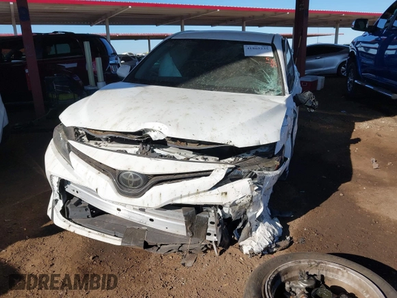 2020 Toyota Camry LE with VIN 4T1C11AK7LU401666, listed as a IAAI auction lot 41865235 with 69,189 mi miles. Bid and sale history available at carsss.com. Image 6.