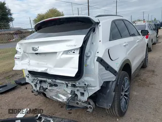 2024 Cadillac XT4 FWD Sport with VIN 1GYFZER48RF180481, listed as a IAAI auction lot 41093587 with 3,982 mi miles and . Bid and sale history available at DreamBid. Image 4.
