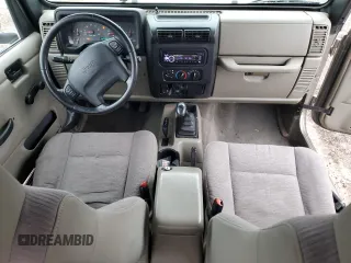2004 Jeep Wrangler Rubicon with VIN 1J4FA69S24P743345, listed as a Copart auction lot 87067154 with 153,783 mi miles and Salvage Title. Bid and sale history available at carsss.com. Image 8.