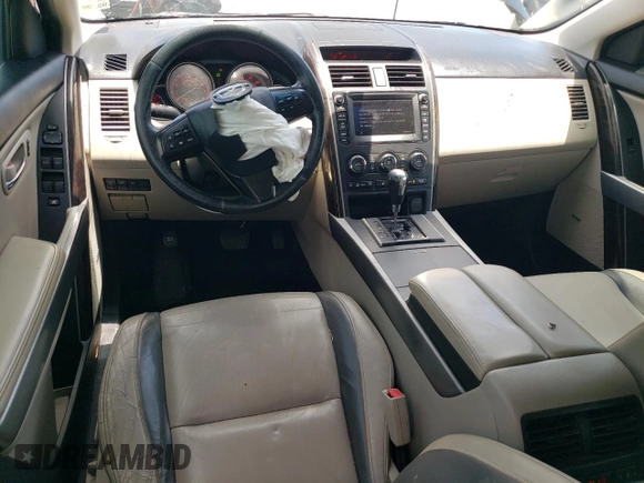 2012 Mazda CX-9 Grand Touring with VIN JM3TB2DA4C0361023, listed as a Copart auction lot 63839005 with 140,784 mi miles and Salvage title. Bid and sale history available at DreamBid. Image 8.