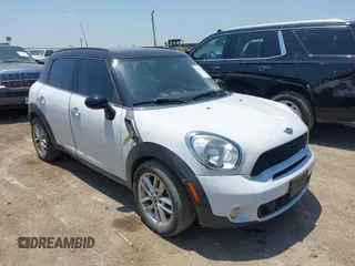 2014 MINI Countryman S with VIN WMWZC3C54EWP27859, listed as a IAAI auction lot 39592610 with 105,264 mi miles and . Bid and sale history available at DreamBid. Image 1.