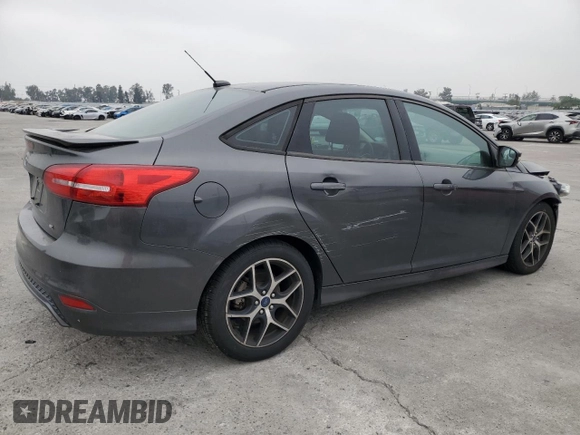 2016 Ford Focus SE z VIN 1FADP3F23GL405565, wystawiony jako Copart lot #60173935 z przebiegiem 82 167 mil mil oraz Szkoda całkowita • Salvage title. Historia ofert i sprzedaży dostępna na DreamBid. Obrazek 3.