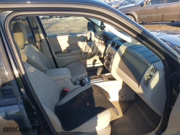 2011 Ford Escape XLT with VIN 1FMCU9DG4BKC30933, listed as a IAAI auction lot 40828476 with 146,808 mi miles. Bid and sale history available at carsss.com. Image 5.