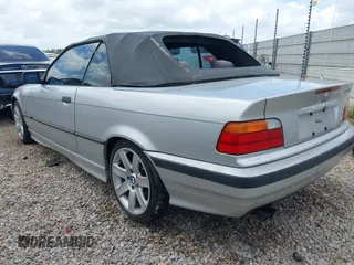 1998 BMW 3 Series 323icA with VIN WBABJ8334WEM22565, listed as a IAAI auction lot 41927799 with 165,077 mi miles. Bid and sale history available at carsss.com. Image 3.