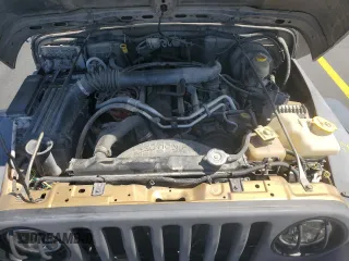 2003 Jeep Wrangler Sport z VIN 1J4FA49S43P327283, wystawiony jako Copart lot #59036295 z przebiegiem 158 108 mil mil oraz Szkoda całkowita • Salvage title. Historia ofert i sprzedaży dostępna na DreamBid. Obrazek 11.