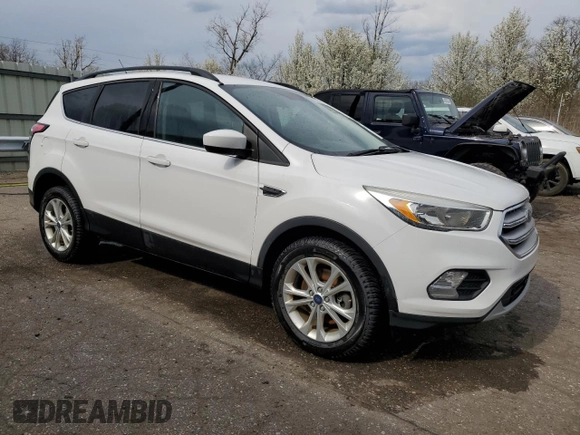 2018 Ford Escape SE with VIN 1FMCU9GD5JUA41244, listed as a Copart auction lot 54447615 with 128,542 mi miles and Clean Title. Bid and sale history available at carsss.com. Image 4.
