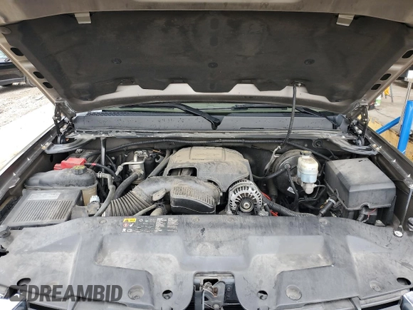 2012 GMC Sierra 1500 SLT with VIN 3GTP2WE74CG310914, listed as a Copart auction lot 56049905 with 106,882 mi miles and Salvage title. Bid and sale history available at DreamBid. Image 11.