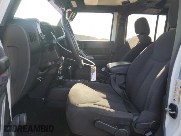 2018 Jeep Wrangler Unlimited Sport S with VIN 1C4BJWDG5JL846821, listed as a Copart auction lot 53310315 with 84,880 mi miles and Salvage title. Bid and sale history available at DreamBid. Image 7.