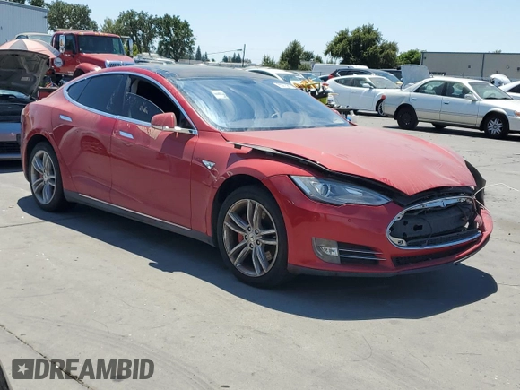 2014 Tesla Model S 60 with VIN 5YJSA1H1XEFP31861, listed as a Copart auction lot 65275815 with Not provided miles and Clean title. Bid and sale history available at DreamBid. Image 4.