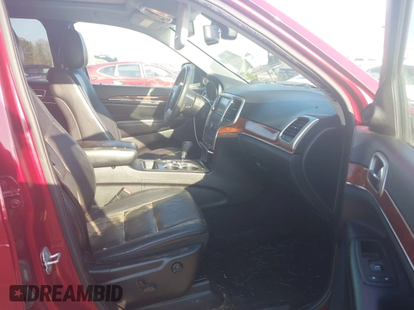 2013 Jeep Grand Cherokee Limited with VIN 1C4RJEBT3DC564366, listed as a IAAI auction lot 41485576 with 153,000 mi miles. Bid and sale history available at carsss.com. Image 5.