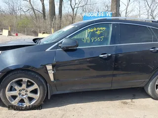 2012 Cadillac SRX Performance Collection z VIN 3GYFNEE31CS569555, wystawiony jako IAAI lot #41919585 z przebiegiem 126 991 mil mil oraz . Historia ofert i sprzedaży dostępna na DreamBid. Obrazek 14.