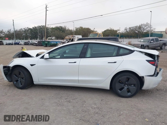 2022 Tesla Model 3 Long Range z VIN 5YJ3E1EB9NF115364, wystawiony jako IAAI lot #41618947 z przebiegiem 58 196 mil mil oraz . Historia ofert i sprzedaży dostępna na DreamBid. Obrazek 13.