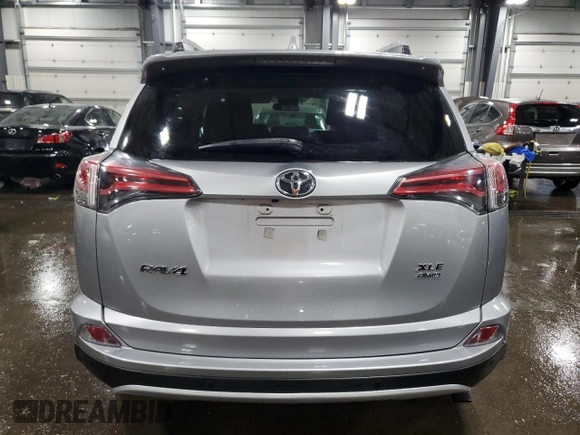 2016 Toyota RAV4 XLE with VIN 2T3RFREV9GW463274, listed as a Copart auction lot 59784805 with 99,138 mi miles and Salvage title. Bid and sale history available at DreamBid. Image 6.
