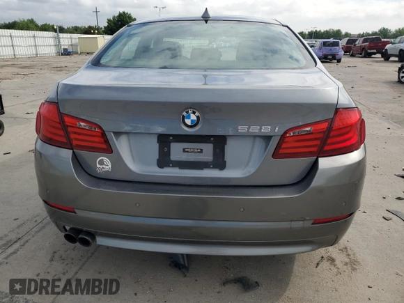 2012 BMW 5 Series 528i xDrive with VIN WBAXH5C58CDW08676, listed as a Copart auction lot 56765105 with 105,147 mi miles and Salvage title. Bid and sale history available at DreamBid. Image 6.