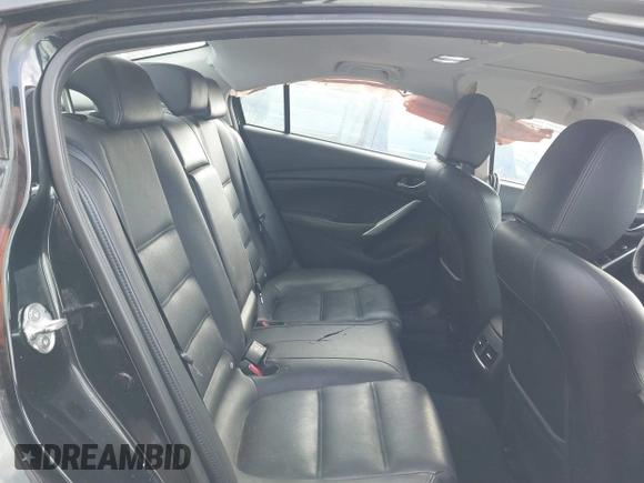 2016 Mazda 6 i Grand Touring with VIN JM1GJ1W54G1454115, listed as a IAAI auction lot 41203298 with 104,632 mi miles and . Bid and sale history available at DreamBid. Image 8.