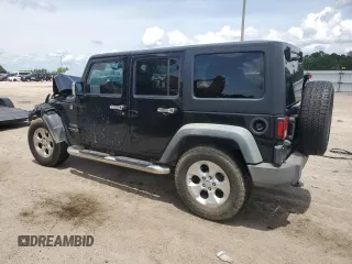 2012 Jeep Wrangler Unlimited Sport z VIN 1C4BJWDG4CL243538, wystawiony jako Copart lot #58826675 z przebiegiem 126 646 mil mil oraz Szkoda całkowita • Salvage title. Historia ofert i sprzedaży dostępna na DreamBid. Obrazek 2.