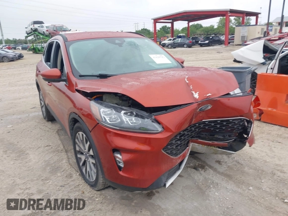 2020 Ford Escape Titanium Hybrid with VIN 1FMCU0DZ1LUB13684, listed as a IAAI auction lot 41629782 with 31,669 mi miles and . Bid and sale history available at DreamBid. Image 1.