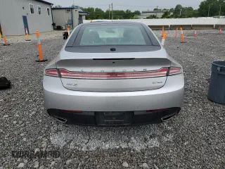 2016 Lincoln MKZ z VIN 3LN6L2JK1GR617572, wystawiony jako Copart lot #59119845 z przebiegiem 155 191 mil mil oraz Szkoda całkowita • Salvage title. Historia ofert i sprzedaży dostępna na DreamBid. Obrazek 6.