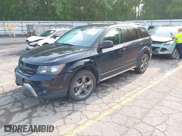 2015 Dodge Journey Crossroad with VIN 3C4PDDGG6FT740760, listed as a IAAI auction lot 42428742 with 215,219 mi miles and . Bid and sale history available at DreamBid. Image 2.