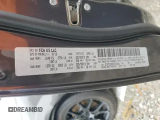 2017 Dodge Journey SXT z VIN 3C4PDCBG3HT516401, wystawiony jako Copart lot #56498445 z przebiegiem 65 156 mil mil oraz Szkoda całkowita • Salvage title. Historia ofert i sprzedaży dostępna na DreamBid. Obrazek 13.