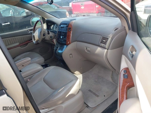 2004 Toyota Sienna XLE with VIN 5TDBA22C84S022369, listed as a IAAI auction lot 41463689 with 175,402 mi miles. Bid and sale history available at carsss.com. Image 5.