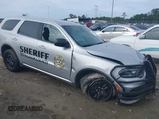 2023 Dodge Durango Pursuit with VIN 1C4SDJFT5PC629959, listed as a IAAI auction lot 40274866 with 6,877 mi miles and . Bid and sale history available at DreamBid. Image 1.