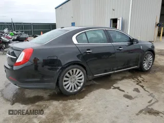 2015 Lincoln MKS z VIN 1LNHL9DK6FG604609, wystawiony jako Copart lot #56243135 z przebiegiem 82 622 mil mil oraz Szkoda całkowita • Salvage title. Historia ofert i sprzedaży dostępna na DreamBid. Obrazek 3.